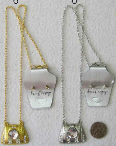 gold-and-silver-colored-necklace-and-earring-set